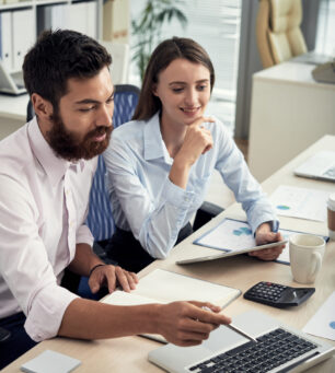 Positive financial manager discussing strategy of company development at meeting