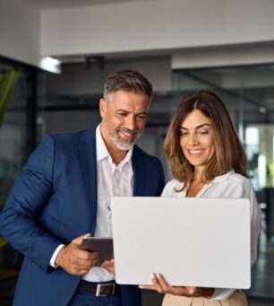 Vertical,Portrait,Of,Mature,Latin,Business,Man,And,European,Business